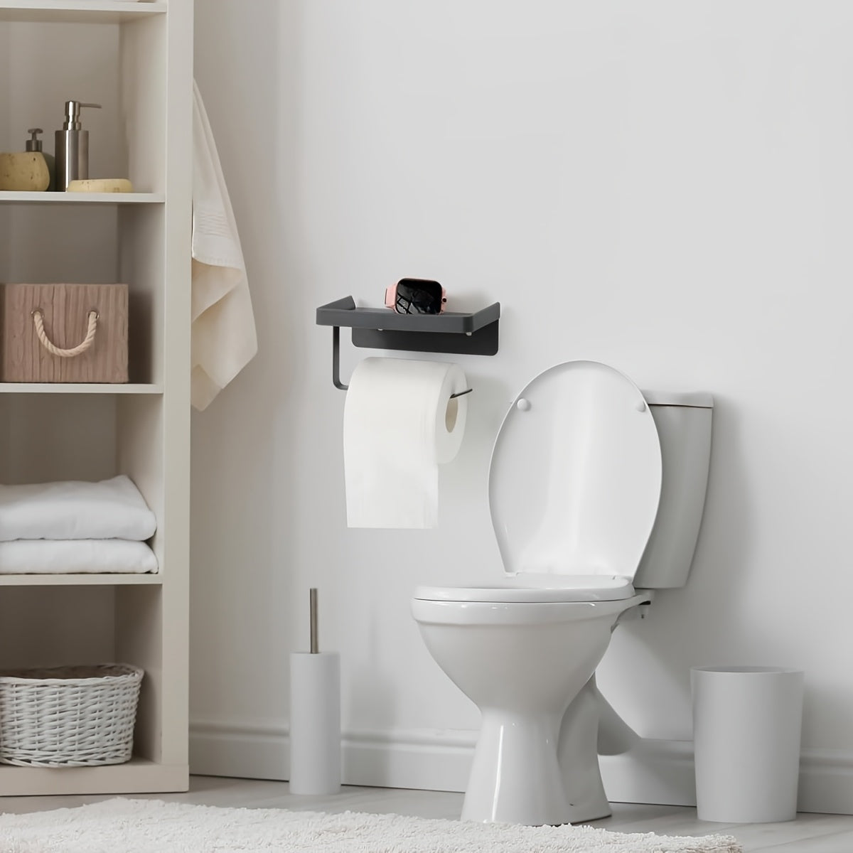 A Black Metal Toilet Paper Holder That Is Easy to Install Without Nails, Also Serves As a Multifunctional Storage Rack for Kitchens And Bathrooms, Ideal for Organizing Spices And Other Items