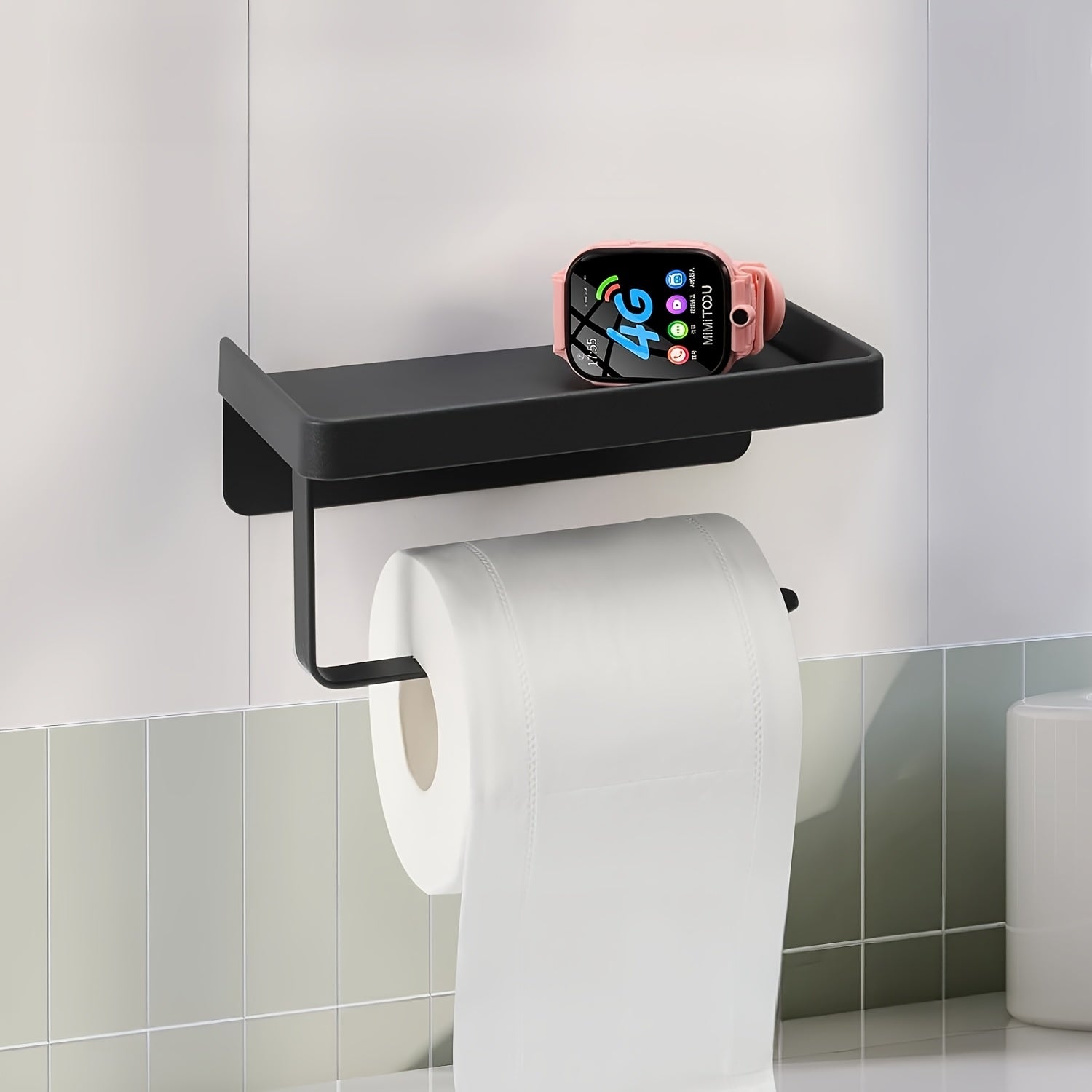 A Black Metal Toilet Paper Holder That Is Easy to Install Without Nails, Also Serves As a Multifunctional Storage Rack for Kitchens And Bathrooms, Ideal for Organizing Spices And Other Items